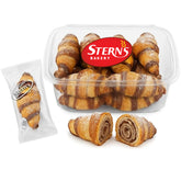 Stern's Bakery sugar-free cinnamon croissant on a plate, ideal with morning coffee.