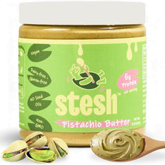 Stesh Pistachio Butter full jar on counter, creamy, protein-rich snack ready.