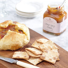 Stonewall Kitchen Major Grey's chutney served with a cheese board and crackers.