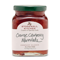Stonewall Kitchen orange cranberry marmalade jar on counter, ideal for breakfast.