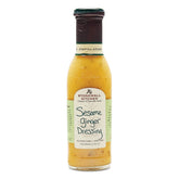Stonewall Kitchen Sesame Ginger Dressing bottle on a counter, premium flavor ready to elevate salads.