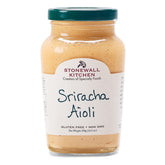 Stonewall Kitchen Sriracha Aioli bottle pour highlights bold chili garlic flavor