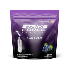 Strike Force Energy grape stick packet pouring into water for a sugar-free energy boost.