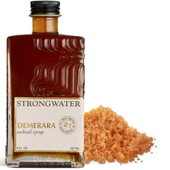 Strongwater Rich Demerara Syrup bottle pours to flavor balanced cocktails.