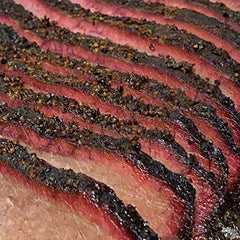 SuckleBusters 1836 Beef Rub on brisket for a rich crust
