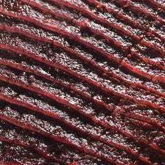 SuckleBusters 1836 Beef Rub on steak for bold pepper crust