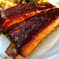 SuckleBusters Honey BBQ Rub shaker adds sweet smoky flavor to meals
