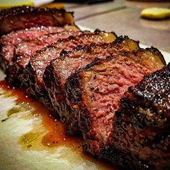 SuckleBusters SPG rub on pork chops to boost flavor without gluten.