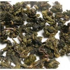 Summit Tea Tie Guan Yin Oolong tea brewed cup reveals a light yellow-green infusion