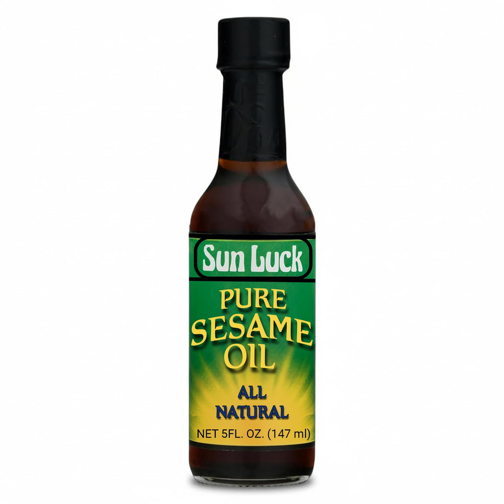 Sun Luck Pure Sesame Oil bottle pour enhances stir-fries with toasted aroma.