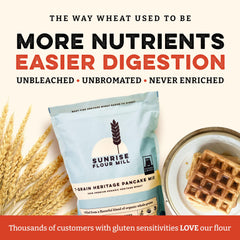 Golden waffles emerging from Sunrise Flour Mill waffle iron with crisp exterior.