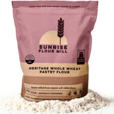 Sunrise Flour Mill heritage whole wheat pastry flour pour highlights a light, airy texture for pastries.