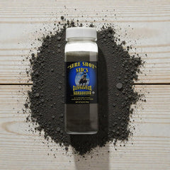 Sure Shot Sid’s Gunpowder Seasoning on pork chops enhances grill aromatics.