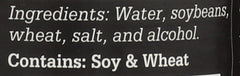 Sushi Chef dark soy sauce on a prep board for sushi rolls and marinating.