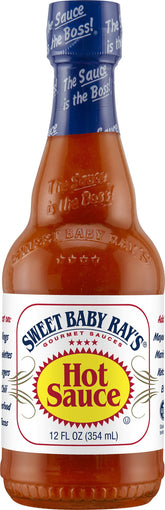 Sweet Baby Ray's Gourmet Hot Sauce bottle pour, adding bold, smoky heat to grilled favorites.