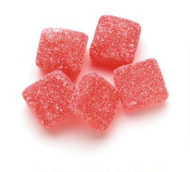 Sweet Candy Company red cinnamon gummy squares offer bold spicy flavor for snacking and gifting