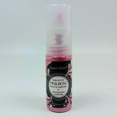 Sweet Spell pink glitter spray on cupcakes for a delicate, edible shimmer