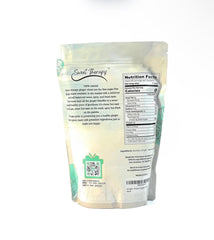 Sweet Therapy ginger chews held in hand highlighting chewy texture.