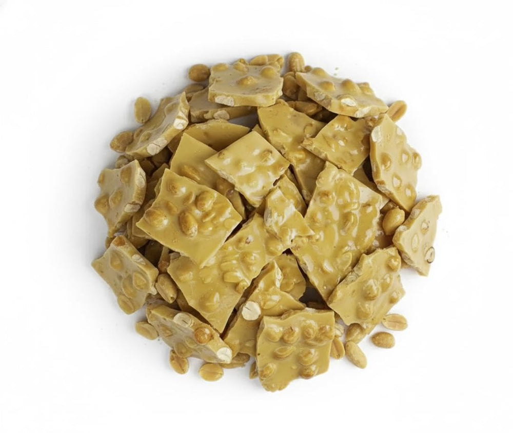SweetGlob Old Fashioned Peanut Brittle close-up shows roasted peanuts for a crunchy snack.