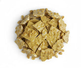 SweetGlob Old Fashioned Peanut Brittle close-up shows roasted peanuts for a crunchy snack.