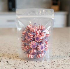 SweetGlob Starlight Mint red and white swirl on display.