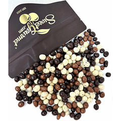 SweetGourmet chocolate-covered espresso beans in white chocolate offering a crisp coffee-forward bite.