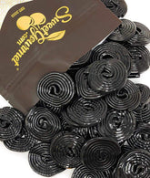 SweetGourmet Italian black licorice wheels close-up for snacking