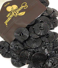 SweetGourmet Italian black licorice wheels close-up for snacking