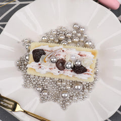 SweetGrove Silver Sprinkles decorate cookies with a glossy, eye-catching touch.