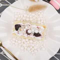 SweetGrove White Pearl Sprinkles on ice cream for festive topping.