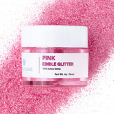 Sweets Indeed hot pink edible glitter jar adds bold sparkle to drinks and desserts.