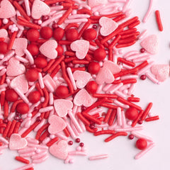 Sweets Indeed pink jimmies create romantic color pops on treats.
