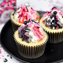 Sweets & Treats Boutique Minnie Mouse decorations in pink and black brighten desserts