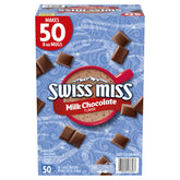 Swiss Miss cocoa packets with steaming cup for quick, cozy moments