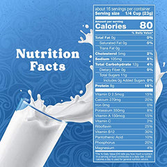 Swiss Miss nonfat dry milk being poured into a mug to mix into warm cocoa.