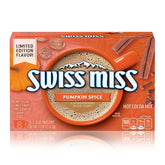 Swiss Miss Pumpkin Spice packaging close-up highlights premium cocoa for cozy winter drinks.