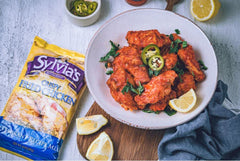 Sylvia's Southern flavor versatile coating suits chicken, fish, and vegetables.