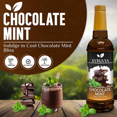 Close-up of Syruvia bottle beside a creamy latte with rich mint notes.