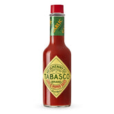 TABASCO Cayenne Garlic Pepper Sauce bottle adds smoky, savory flavor to meals.