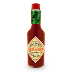TABASCO Family Reserve Pepper Sauce bottle pour highlighting premium aging and small-batch quality.