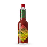TABASCO Habanero sauce glass bottle front, adding Caribbean heat to meals.