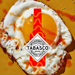 TABASCO Original Red Pepper Sauce pour action over eggs and hash browns
