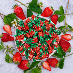 Taboom candy buffet display featuring bulk strawberry candies.