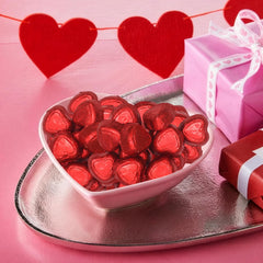 Taboom red-foil wrapped chocolate hearts perfect for Valentine's Day decor.