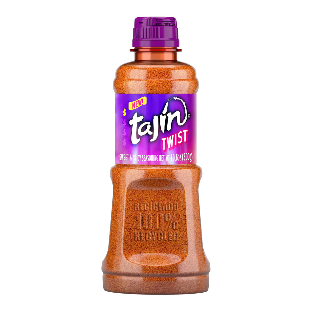 Tajín Twist bottle closeup, highlighting the sweet-spicy seasoning for snacks.