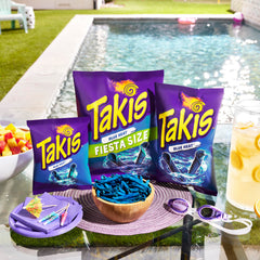 Takis Blue Heat bag pouring chips for a quick office break.