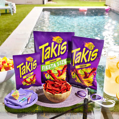 Takis Fuego rolled chip texture close-up emphasizing crunchy seasoned surface