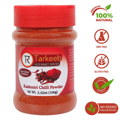Tarkeeb Kashmiri chili powder pouring for controlled amounts and mild heat.