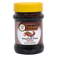 Tarkeeb Tamarind paste bottle closeup showing smooth texture for authentic dishes
