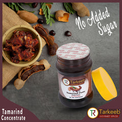 Tarkeeb Tamarind paste bottle pouring into a pan to flavor curries